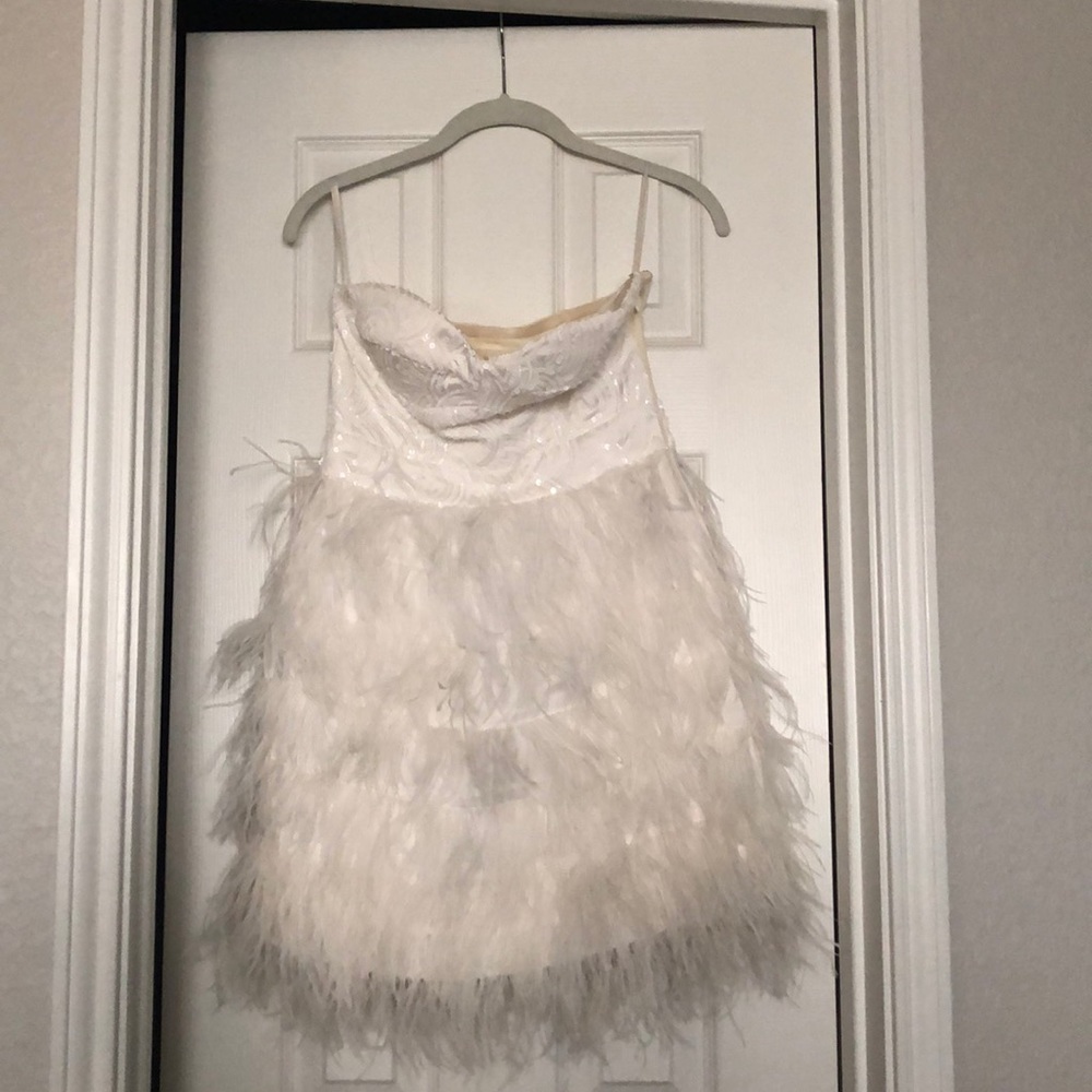 Sequin and feather white party dress